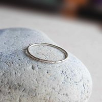 Delicate hammer textured 925 sterling silver stackable finger, midi or thumb ring, hand crafted by The Tiny Tree Frog JewelleryUltra thin hammered recycled sterling silver stacking ring, handmade by The Tiny Tree Frog Jewellery