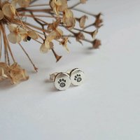 Recycled, hand stamped sterling silver paw print stud earrings, artisan made by The Tiny Tree Frog Jewellery