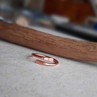 Simple copper crossover finger, midi or thumb ring, hand made by The Tiny Tree Frog Jewellery