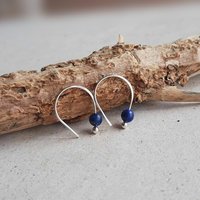 925 sterling silver and dark blue lapis lazuli gemstone U-shaped arc earrings, hand crafted by The Tiny Tree Frog Jewellery