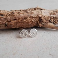 Hammer textured recycled sterling silver spiral swirl stud earrings, hand crafted by The Tiny Tree Frog Jewellery