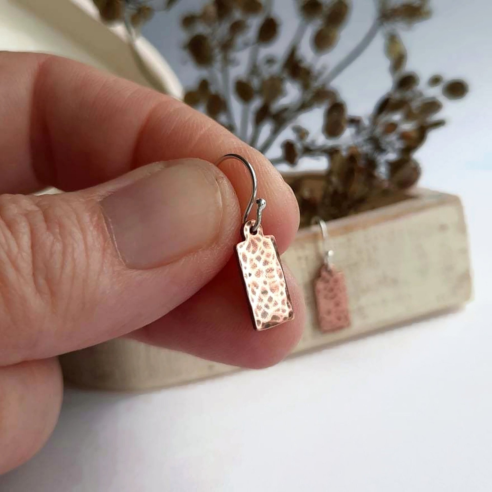 Hammered and textured copper drop earrings, handmade by The Tiny Tree Frog Jewellery