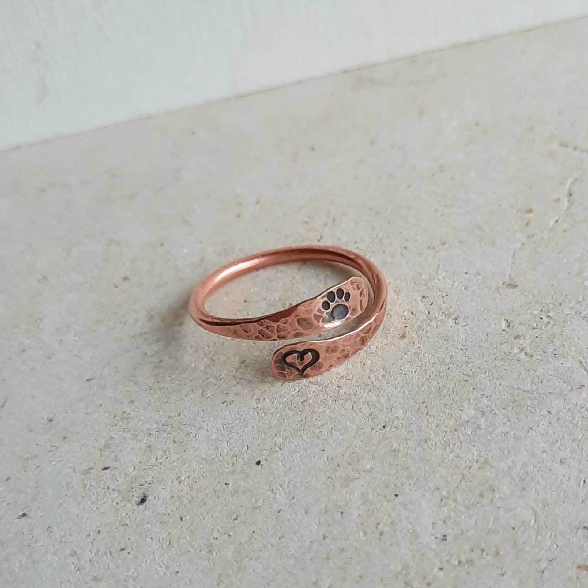 Oxidised copper paw print and love heart adjustable Viking style wrap around ring, handmade by The Tiny Tree Frog Jewellery
