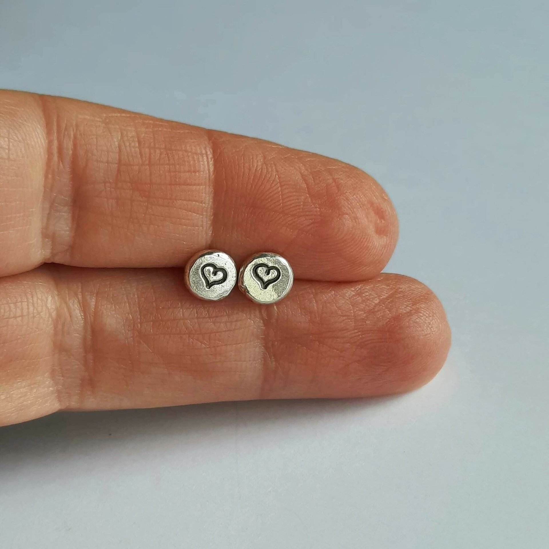 Reclaimed 925 sterling silver love heart stud earrings, handcrafted by The Tiny Tree Frog Jewellery