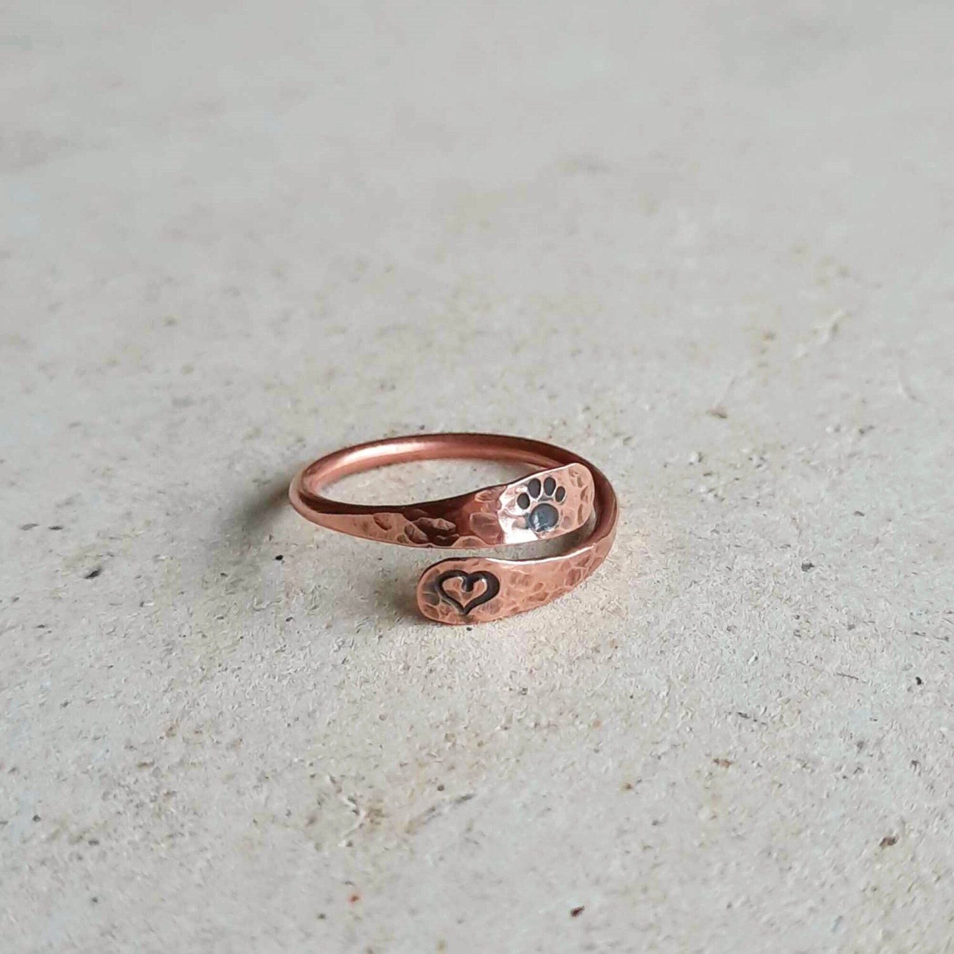 Copper paw print and love heart adjustable wrap around ring, handmade by The Tiny Tree Frog Jewellery