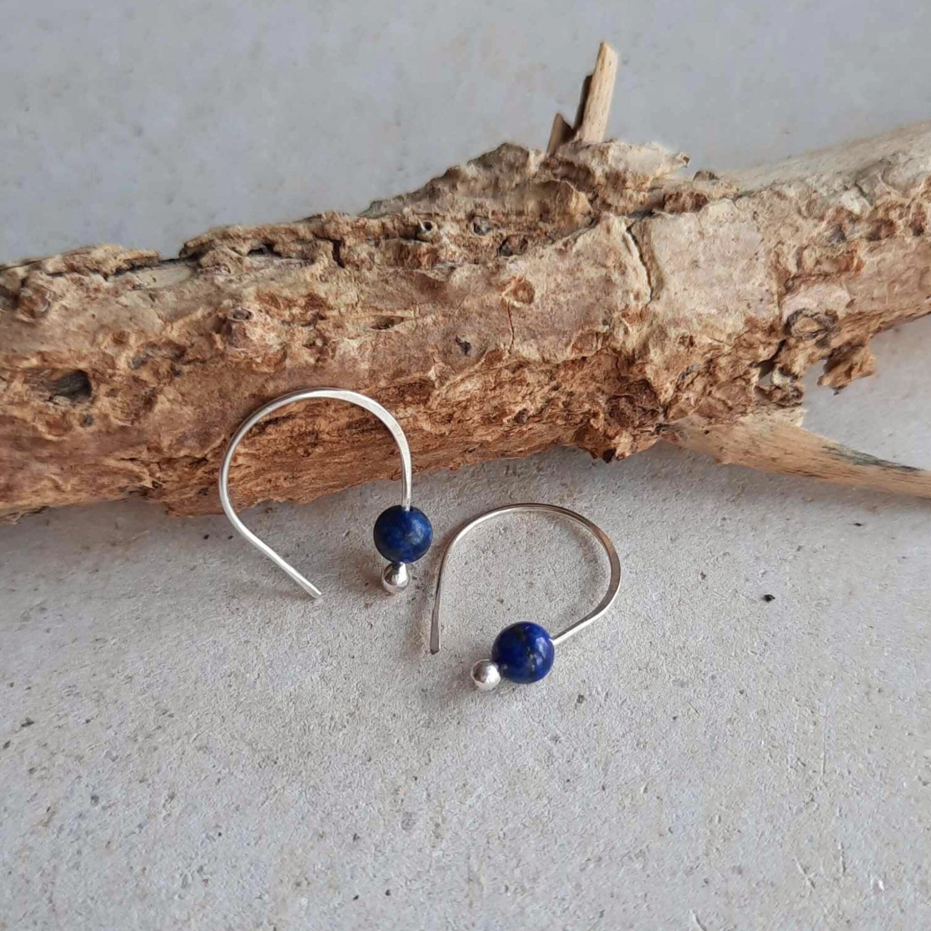 Recycled sterling silver and lapis lazuli gemstone half hoop earrings, handcrafted by The Tiny Tree Frog Jewellery