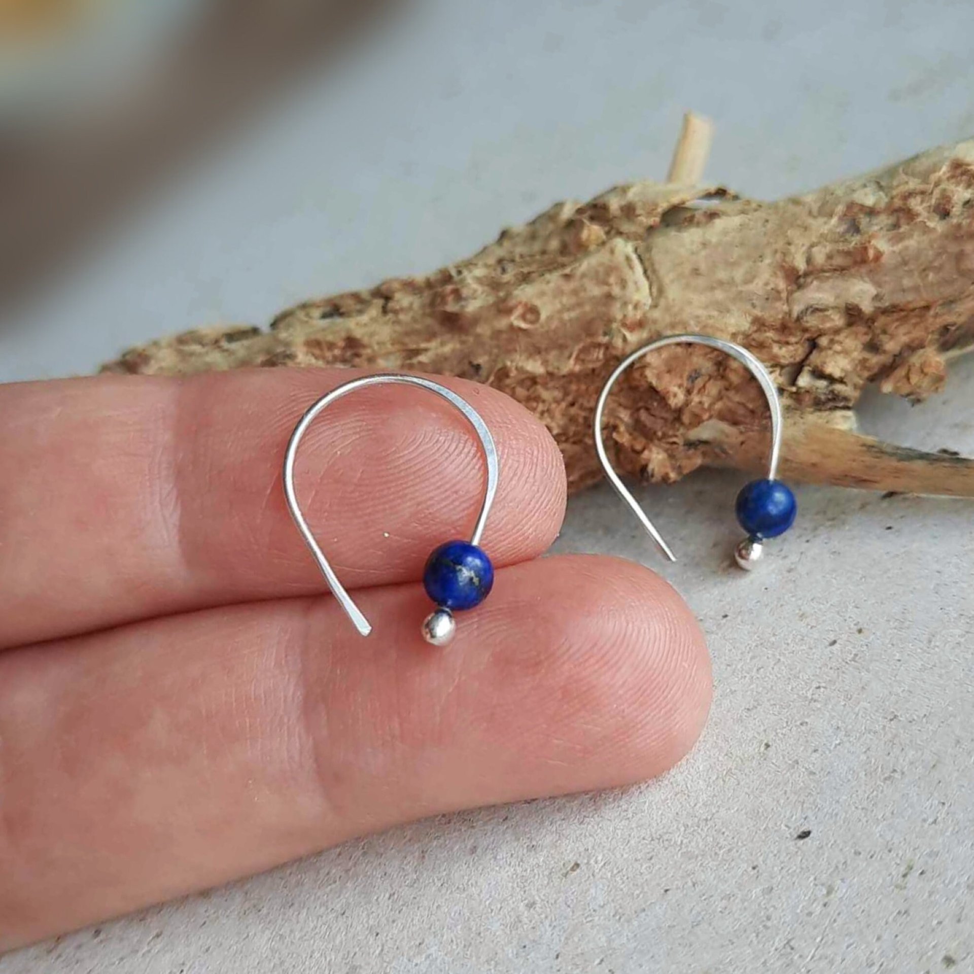 Blue gemstone pull through sterling silver earrings, hand made by The Tiny Tree Frog Jewellery