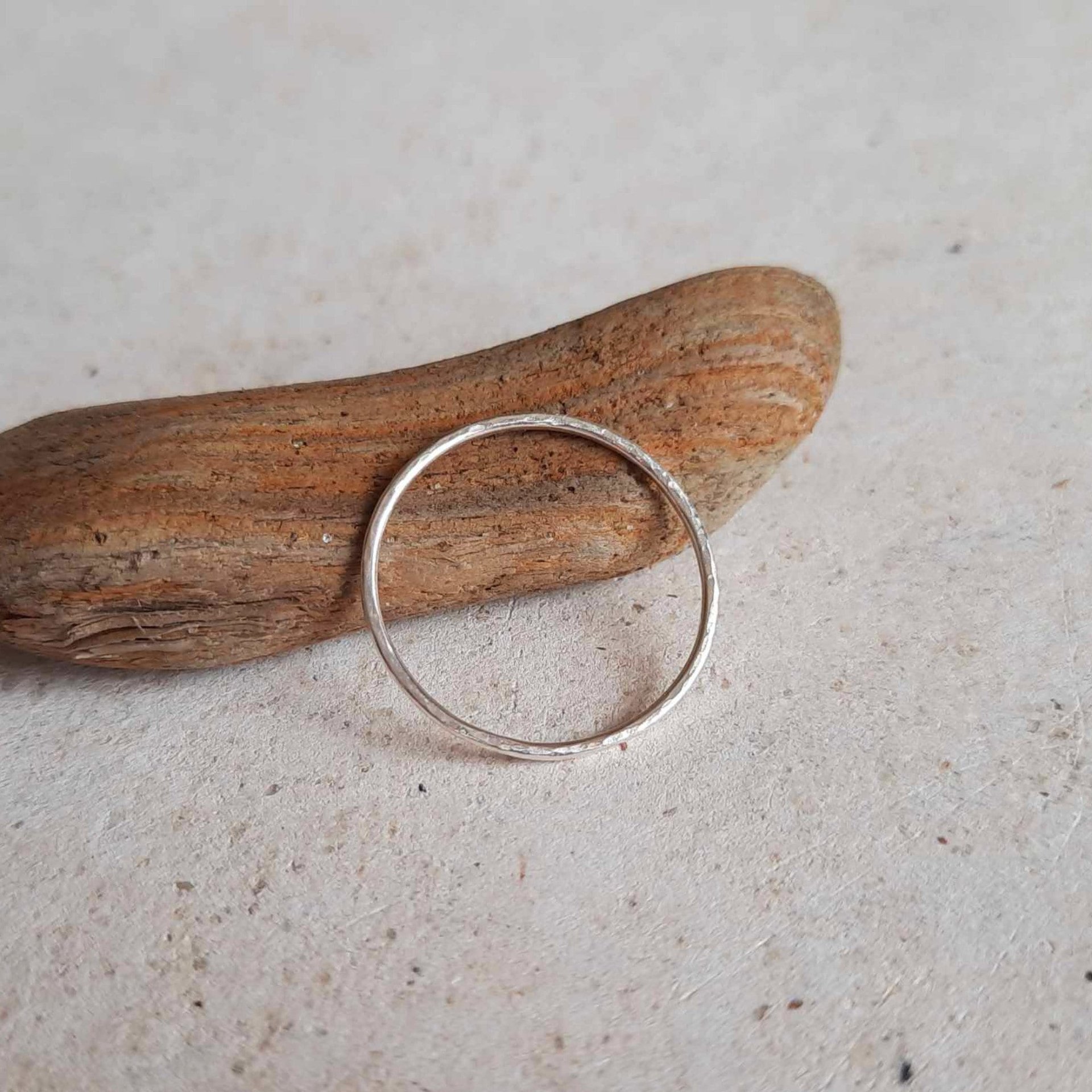 Skinny 925 sterling silver thumb ring, handcrafted by The Tiny Tree Frog Jewellery