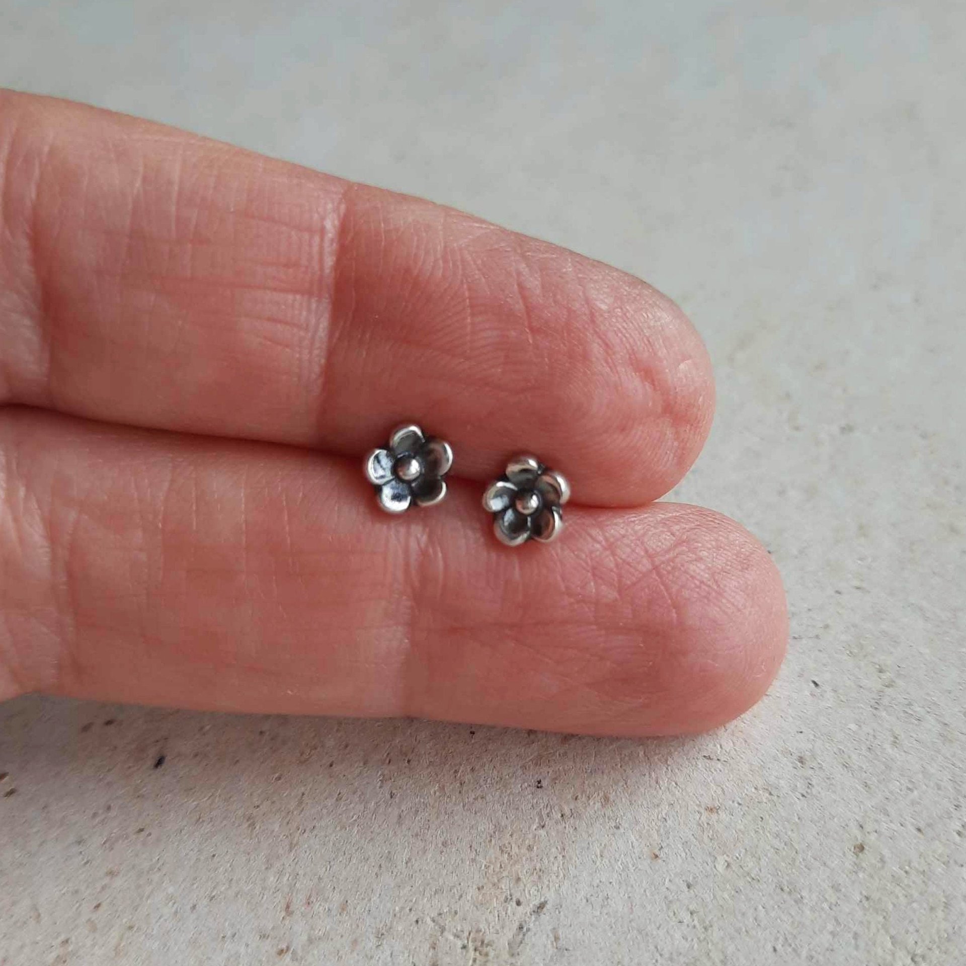 Small forget me not flower studs, hand made by The Tiny Tree Frog Jewellery
