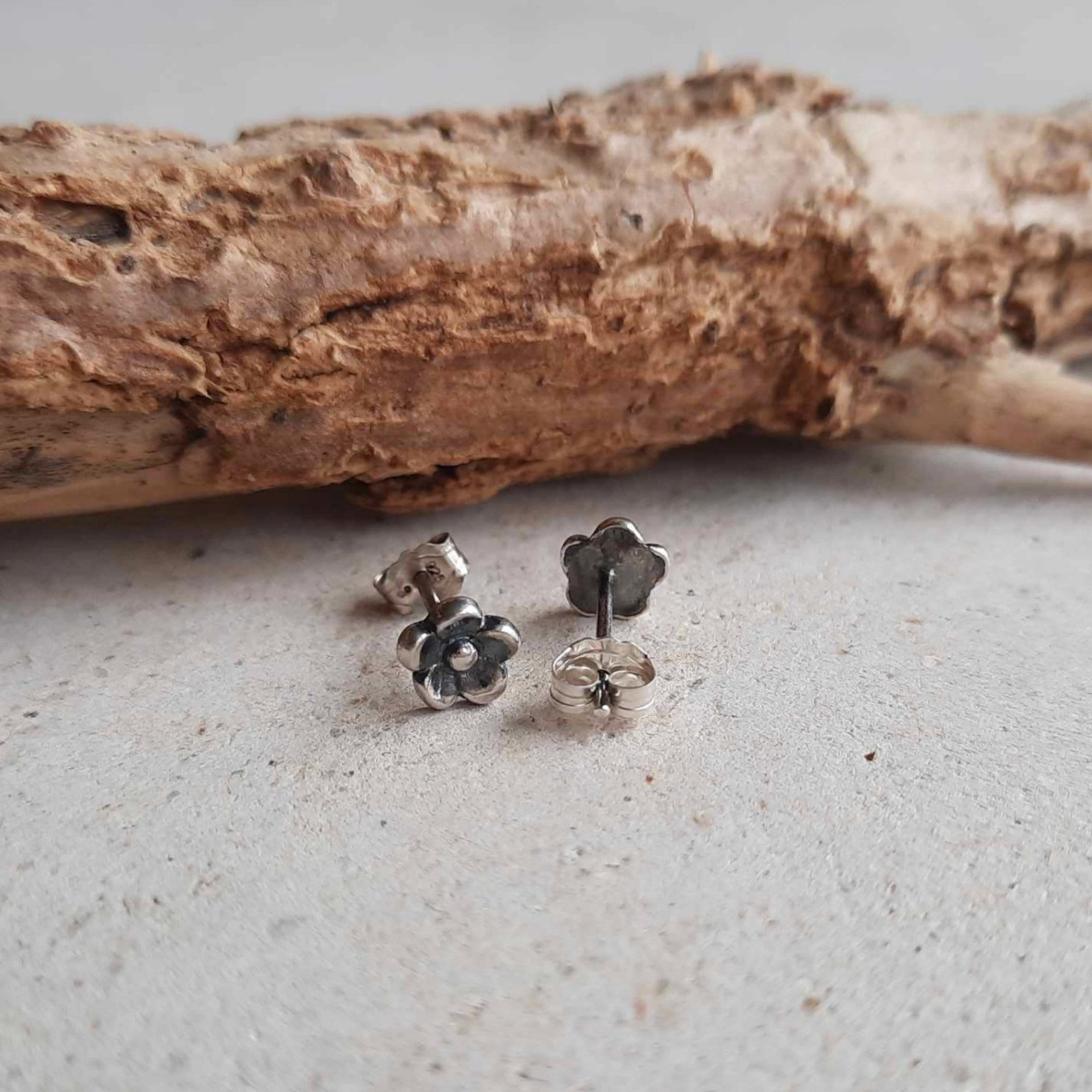 Dainty oxidised fine and sterling silver forget me not post earrings, hand crafted by The Tiny Tree Frog Jewellery