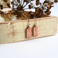 Hammered and textured copper drop earrings, handmade by The Tiny Tree Frog Jewellery