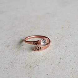 Copper paw print and love heart adjustable wrap around ring, handmade by The Tiny Tree Frog Jewellery