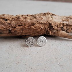 Hammered recycled sterling silver spiral stud earrings, handmade by The Tiny Tree Frog Jewellery