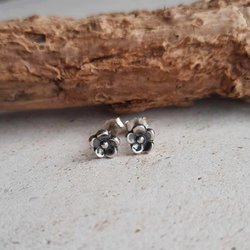 Tiny oxidised fine silver forget me not flower stud earrings, handmade by The Tiny Tree Frog Jewellery