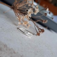 Delicate hammer textured sterling silver adjustable crossover ring, artisan made by The Tiny Tree Frog Jewellery