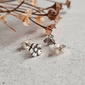 Silver bee and flower mismatched stud earrings with sterling silver posts and butterfly backs