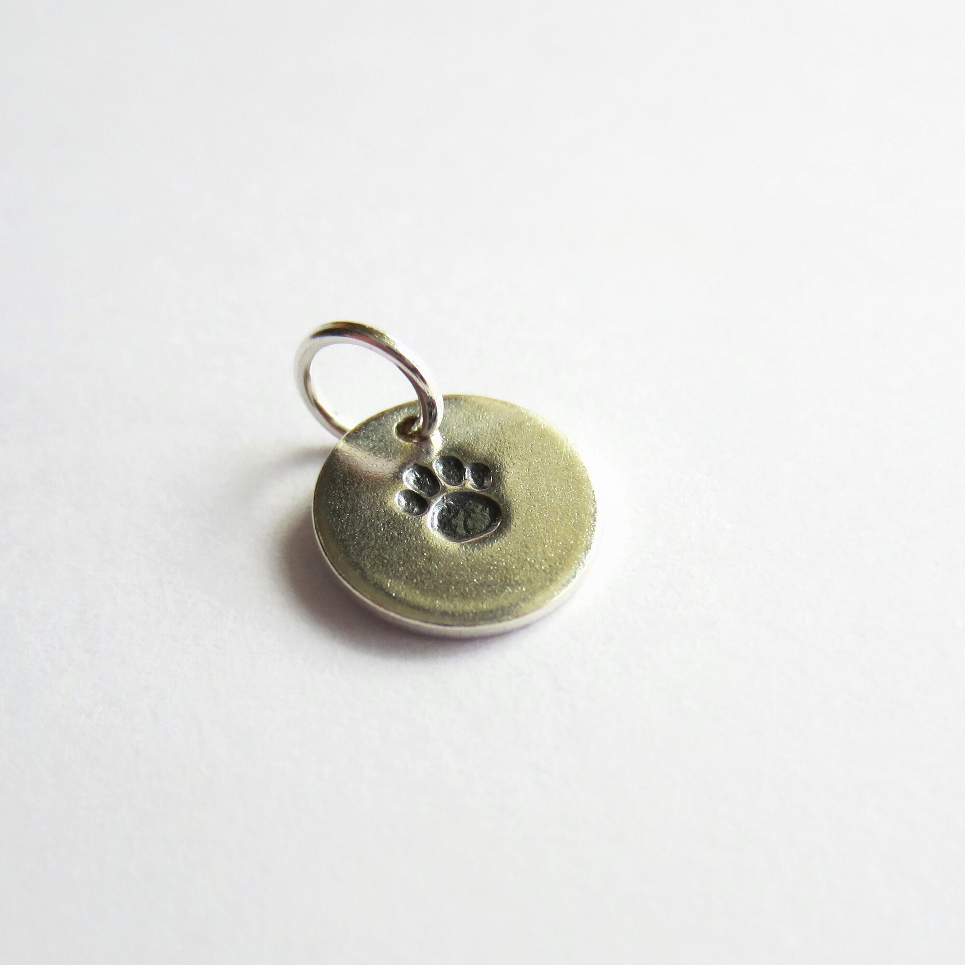 Hand Stamped Sterling Silver Paw Print Charm ~ Handmade by The Tiny Tree Frog Jewellery