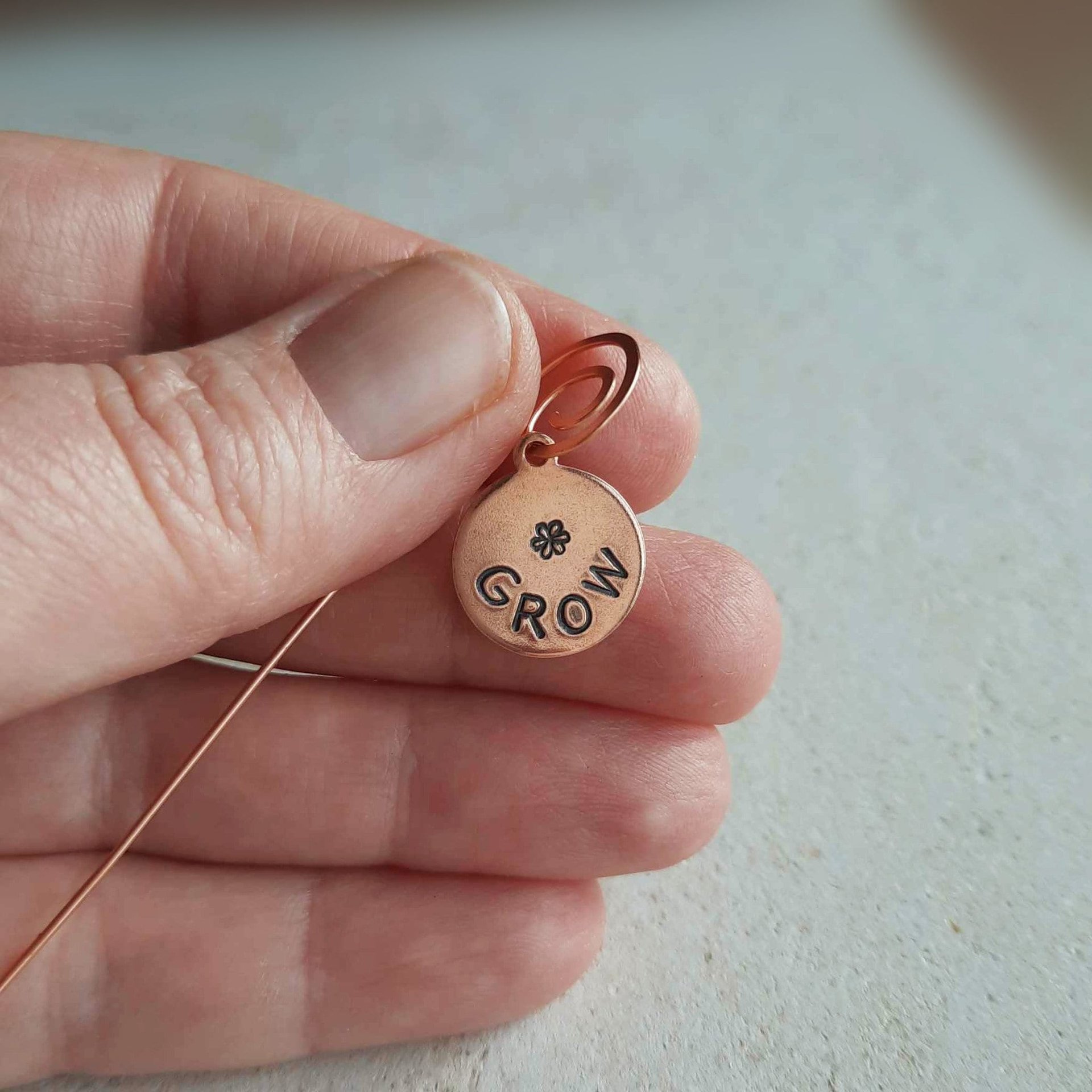 Boho hand stamped copper house plant decoration, hand made by The Tiny Tree Frog Jewellery