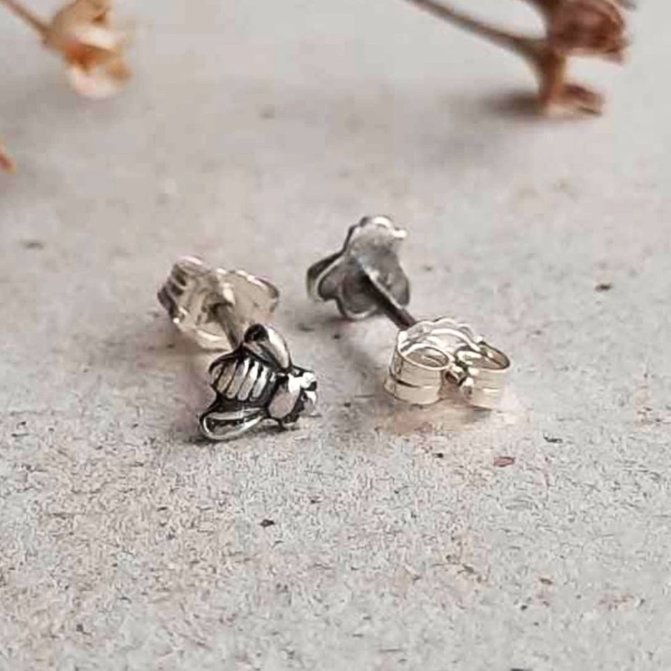 Tiny 5mm fine silver bee stud earrings shown with sterling silver posts and butterfly backs