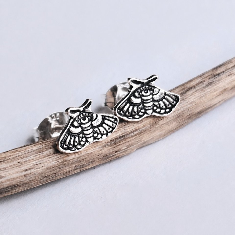 Sterling silver moth stud earrings, handmade with intricate stamped moth detailing